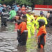 Banjir di Sejumlah Titik di Jakarta, Polantas Berjibaku Atur Lalin